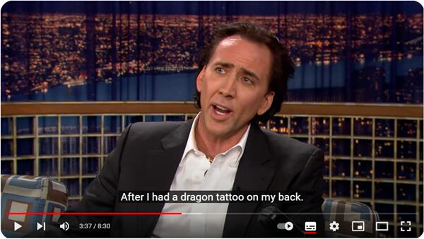 Nicolas Cage di Late Night de bi Conan O'Brien re li ser tatuya xwe ya Zodiac ya Chineseînî parve kir.Rabbit ne ejder!